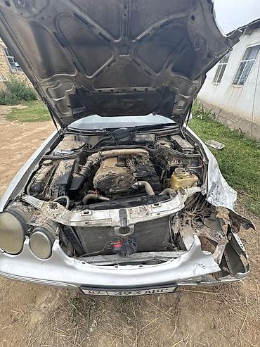Скупка авто: Mercedes-Benz E‑Class (W210), седан, серебристый цвет. Автомобиль — 2