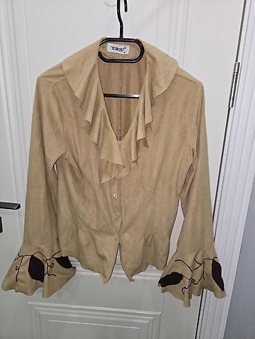 Model: qolsuz düyməli jaket/kofta üstdən geyim - Rəng: açıq bej -
