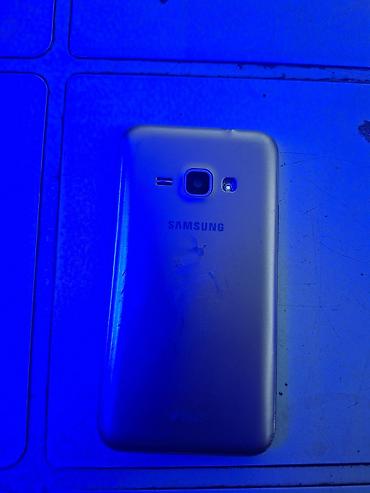 iphonr 8: Samsung Galaxy J1 2016, 8 GB, rəng - Qızılı, İki sim kartlı, Sensor — 3