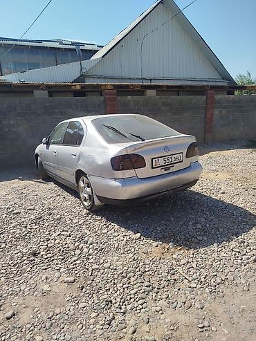 замик: Nissan Primera: 2000 г., 1.8 л, Механика, Бензин, Седан — 4