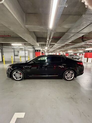Kia: Kia Optima – qara rəng, sedan kuzov. Şəhərdaxili və magistral yollarda — 9