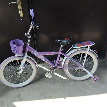 mini velosiped: Uşaq velosipedi – bənövşəyi rəng, çiçək naxışlı dizayn — 1