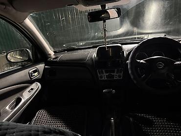 xiaomi su7 max: Nissan Almera: 2004 г., 1.8 л, Автомат, Бензин, Хэтчбэк — 5