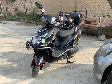 Скутеры: Скутер Skillmax, черный, с богатым комплектом освещения и туристским — 8