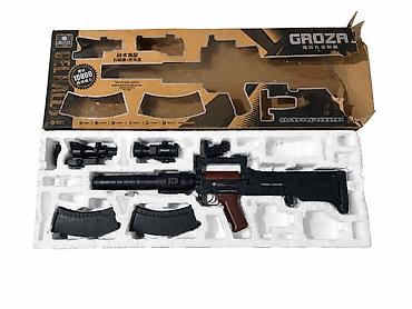 Продаю игрушечный автомат GROZA, стреляет орбизами. Комплектация: *