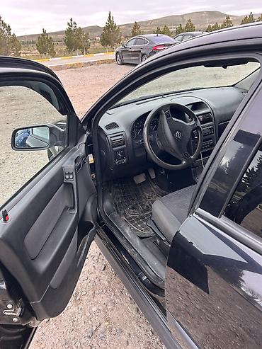 yan guzgulər s: Opel Astra: 1.6 l | 2002 il 275 km Hetçbek — 6