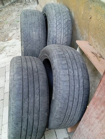 шины 17 лето: Dunlop265/65/17.2шт,Bridgestone235/55/17.2шт.за все 4000с