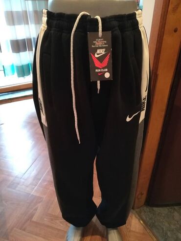 trenerke za muskarce: Sweatpants, 4XL (EU 60), Nike, color - Black, Cotton