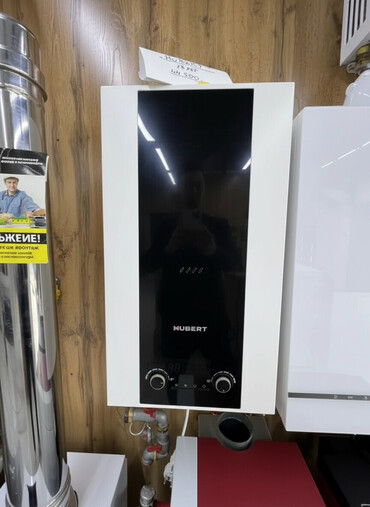 отопление теплый пол: Настенный газовый котел Hubert в белом корпусе с черной панелью