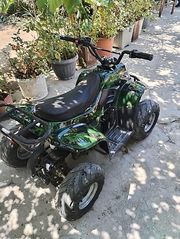 Uşaq dünyası: Uşaq/yeniyetmə üçün elektrikli mini kvadrosikl - Rəng — 2