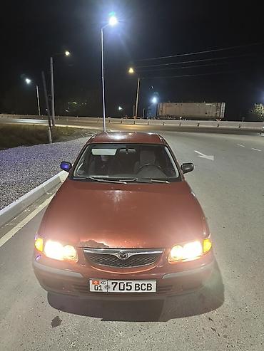глушитель ауди: Mazda 626: 1998 г., 1.8 л, Механика, Бензин, Седан — 2