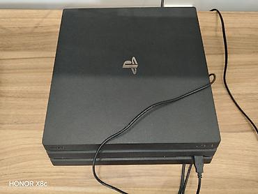 oyun direksiyonu: PlayStation 4 Pro oyun konsolu. Əla vəziyyətdə, 2 orijinal pultla - — 4