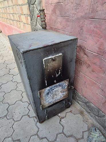 Котел угольный+электричество. Отапливает дом 90 квадратов