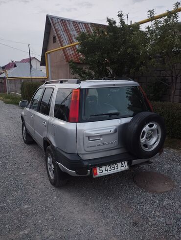 лед на авто: Honda CR-V первого поколения, серебристый компактный кроссовер. Задняя
