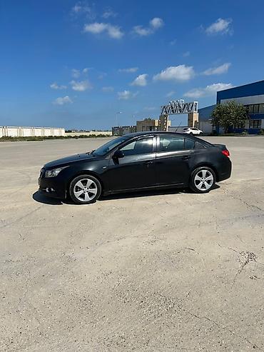 kia rio 2007: Chevrolet Cruze: 1.6 l | 2010 il 197965 km Sedan — 5