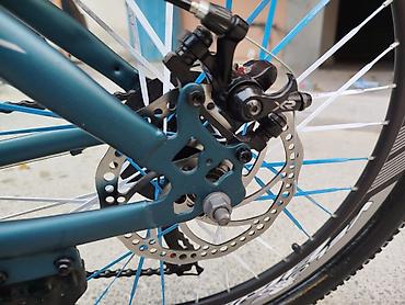 İdman velosipedləri: Dağ velosipedi – 24” təkərlər, enli protektorlu şinlər. Rəng: tünd — 8
