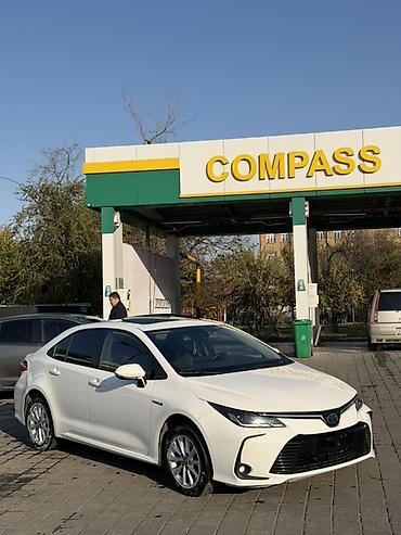 2023 kia ev5: Toyota Corolla: 2020 г., 1.8 л, Вариатор, Гибрид, Седан — 3