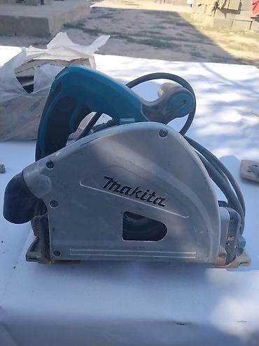 Пилы: Дисковая пила Makita (сетевой инструмент). - Тип: ручная циркулярная — 1