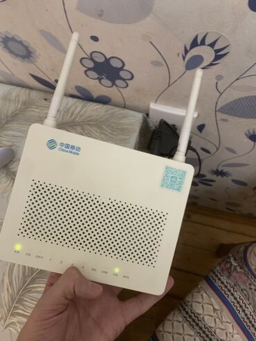 aylıq limitsiz internet: China Mobile markalı Wi‑Fi router Xüsusiyyətlər: - İki ədəd xarici