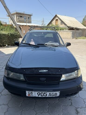 нексия 3 цена в бишкеке: Седан Daewoo Nexia серого цвета, оснащенный багажником на крыше