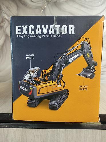 детский экскаватор: Радиоуправляемый экскаватор YIGONG YG258C (серия Alloy Engineering — 2