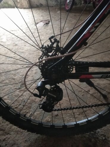 İdman velosipedləri: Dağ velosipedi – Foster markası Xüsusiyyətlər: - Güclü alüminium — 10