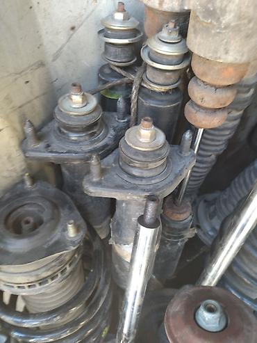 Амортизаторы, пневмобаллоны: Амортизатор передний задний Мазда Демио комплект Рф3 задний св6 задний — 4