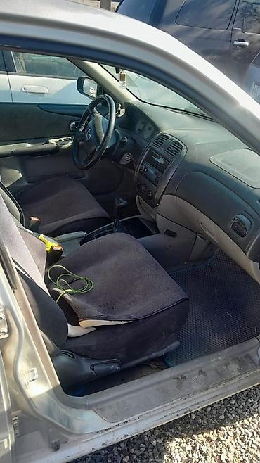 e6 3: Mazda Familia: 2002 г., 1.6 л, Автомат, Бензин, Седан — 2