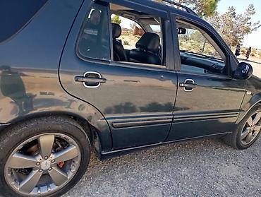 mercedec: Mercedes-Benz ML 320: 3.2 l | 1999 il Ofrouder/SUV — 3