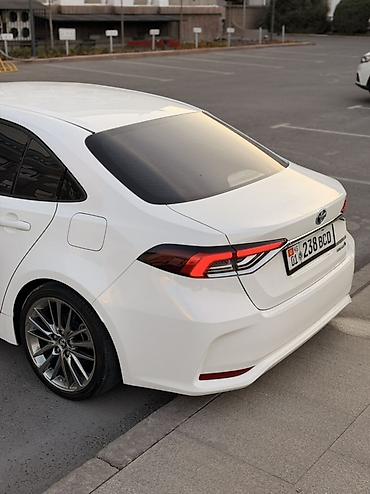 на камри 55: Toyota Corolla: 2022 г., 1.8 л, Вариатор, Гибрид, Седан — 6