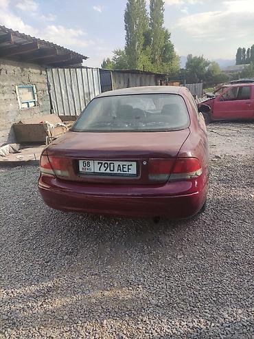 салон т5: Mazda 626: 1993 г., 1.8 л, Механика, Бензин, Седан — 3
