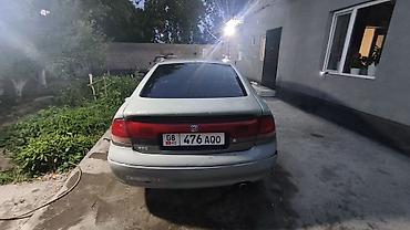 x pipe: Mazda 626: 1993 г., 2 л, Механика, Бензин, Хэтчбэк — 6