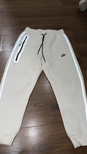 Спортивные брюки Nike - Цвет: молочный/кремовый - Крой: зауженные к