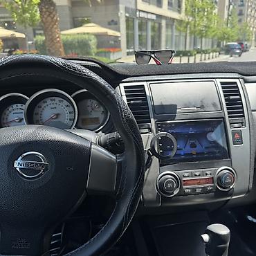 nişan tida: Nissan Tiida: 1.5 l | 2011 il Hetçbek — 1