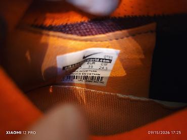 длиная: Футбольные бутсы/сороконожки Nike (бирка внутри: EUR 39, CM 24.5 — 4