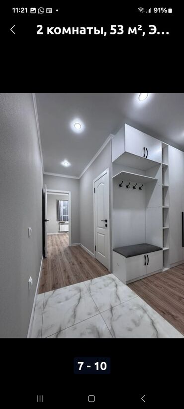 Ремонт под ключ: Современная квартира-студия с новой отделкой и встроенной мебелью - — 8