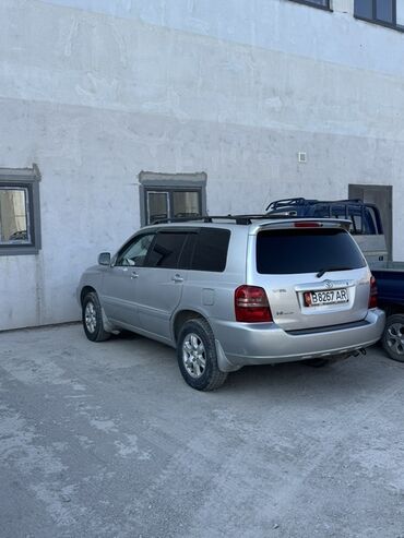 диск шевроле круз: Серебристый внедорожник Toyota Highlander, 2002- жылы чыгарылган