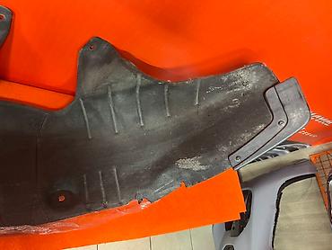 Подкрылки, брызговики, защита днища: Подкрылок колесной арки черного цвета, изготовленный из прочного — 9