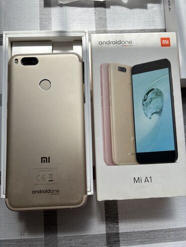 батарейка телефон: Xiaomi, Mi A1, Б/у, 2 GB, цвет - Золотой, 2 SIM