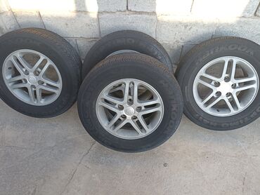 зимные шины r15: Дөңгөлөктөр монтажда 215 / 65 / R 15