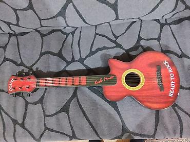 ukulele gitar: Uşaq üçün oyuncaq gitara - Dizayn: Klassik akustik forma — 1