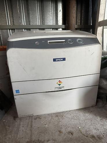 Принтеры: Цветной лазерный принтер Epson AcuLaser C1100. - Тип: лазерный — 1