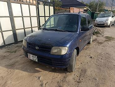 Daihatsu: Daihatsu Cuore: 2003 г., 1 л, Механика, Бензин, Универсал — 1