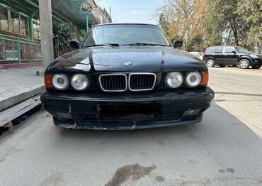 Задний Бампер BMW Б/у, цвет - Черный, Аналог
