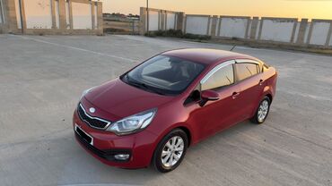 Kia: Kia Pride: 1.4 l | 2013 il Sedan — 10