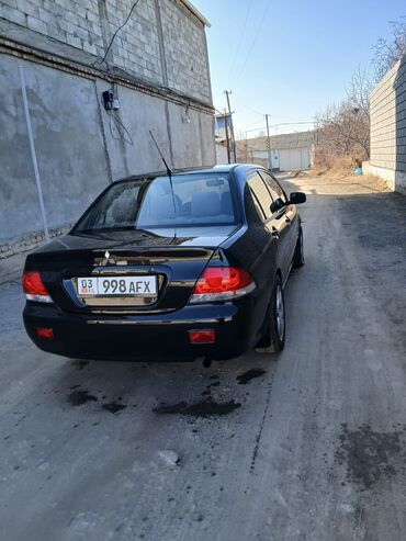 Mitsubishi: Mitsubishi Lancer: 2003 г., 1.6 л, Механика, Седан — 2