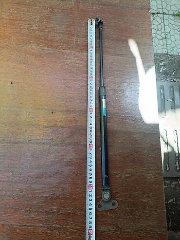 газовые пружины: Две газовые пружины черного цвета, предназначенные для установки в — 3