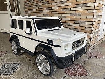 demir tapanca (oyuncaq): Uşaq üçün elektrikli avtomobil – Mercedes-Benz G-Class stilində — 1
