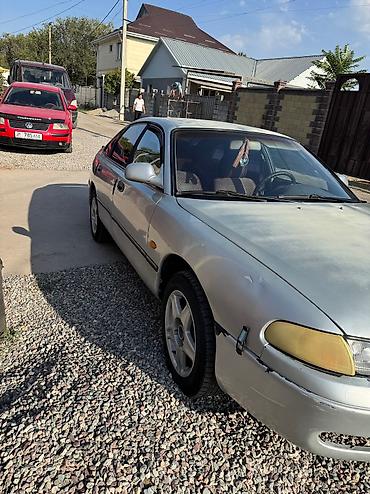 fix jixf: Mazda 626: 1993 г., 2.5 л, Механика, Бензин, Седан — 4