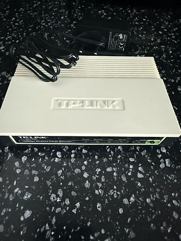 tp link wifi repeater: TP-Link 54Mbps Wireless Range Extender (Wi‑Fi gücləndirici) - Model — 1